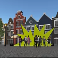 Yellow Star Shaped Installation With Live Band Performance And Colorful Buildings In Street Square