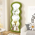 Green Wavy Design Accent Chair in Modern Living Room with White Sofa Mirror and Plants
