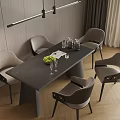 Modern Dining Table With Gray Chairs And Green Fruit Bowl In Contemporary Dining Room