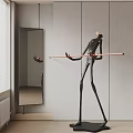 Slim Black Figural Sculpture Holding Long Bar in Modern Minimalist Room