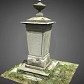 Stone Landscape Sculpture With Ornate Finial And Pedestal Set In Grass Surroundings With Mossy Base
