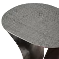 Modern Metallic Side Table With Curved Legs And Textured Round Top