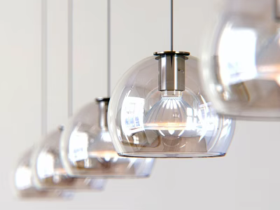 Modern Transparent Glass Pendant Lights With Metal Base And Globular Shape Hanging In A Row 3d model