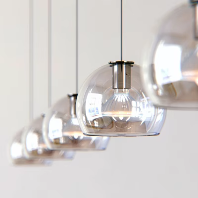 Modern Transparent Glass Pendant Lights With Metal Base And Globular Shape Hanging In A Row 3d model