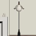 Stylish Floor Lamp With White Ruffled Shade And Side Decorative Elements