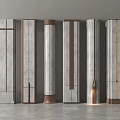 Modern Sleek Columns With Marble Texture And Metallic Accents Arranged In Interior Space