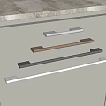 Modern Cabinet Handles In Various Colors Installed On Gray Cabinet Doors