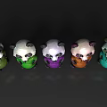 Five Colorful Reptile Plush Figures Standing In Line On Dark Backdrop
