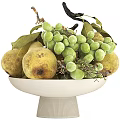 White Bowl Filled With Fresh Green Grapes And Yellow Pears With Leaves