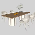 Modern Rectangular Wooden Dining Table With White Chairs Vase Green Plant And Oranges