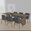 Wooden Dining Table Set With Gray Chairs And Artwork In Bright Room By Window