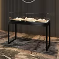 Elegant Glass Display Cabinets With Golden Metal Frame Showcasing Jewelry On Marble Floor