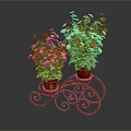 Yellow Flowering Plants in Red Pots on Black Wrought Iron Ornate Stand Against Dark Background