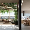 Modern Open Kitchen Interior With Wooden Pergola Climbing Vines And Dining Table
