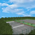 Outdoor Sports Facility With Basketball Courts Green Surfaces Fences Trees And Blue Sky