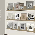Minimalist Wooden Wall Mounted Bookshelf With Stacked Books Including AD Piet Oudolf Landscapes