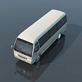 Modern Sleek White Bus Featuring Large Windows And Shiny Surface Reflection