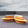 Wooden Outdoor Chairs with Curved Design Metal Backrests in Brick-Paved Area Against Grey Wall
