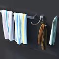 Colorful Striped Towels Hanging On Modern Bathroom Towel Rack And Hooks