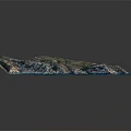 Detailed Mountainous Coastal Terrain With Rocky Elevations And Blue Surrounding Water