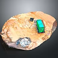Green Toy Truck On Dirt Terrain Model With Rocky Elements And Black Object
