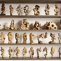 Hand Carved Wooden Sculptures On Shelves With Various Artistic Shapes And Designs