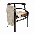 Dark Wooden Frame Armchair With Brown Leather Seat And Light Gray Textured Blanket On Armrest