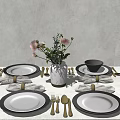 Elegant Dinnerware Set with White Plates Silver Cutlery and Pink Flowers in Vase