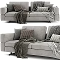 Modern Gray Two-Seater Sofa With Checkered Chevron Pillows And Knitted Blankets 3d model