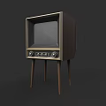 Vintage TV Set With Wooden Legs And Black Screen Front Knobs