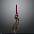 Ornate Golden Candlestick Design With Red Candle And Intricate Base