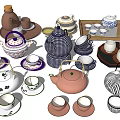 Assorted Ceramic Tea Set Collection With Teapots Cups Saucers And Trays 3d model