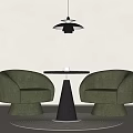 Green Armchairs With Black Cone Shaped Table And Hanging Pendant Light On Round Rug