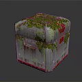 Cube Shaped Decorative Household Item with Moss Covered Surface and Red Silver Accents