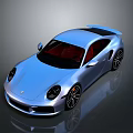 Blue Sports Car With Red Interior Black Wheels And Sleek Modern Design