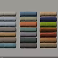 Colorful Folded Fabrics Neatly Arranged In Multiple Columns With Various Colors