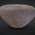 Ancient Clay Bowl With Intricate Carved Patterns And Weathered Surface From Historical Artifact Collection