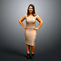 Woman in Beige Dress Standing with Hands on Hips Against Gray Background