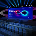 Modern Stage Design With Large Blue Screen 2025 Infinity Symbol Dynamic Lighting And Audience Seats