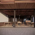 Open Space With Wooden Ceiling Glass Doors Tables Chairs Brick Floor And Green Plants