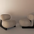 Modern Single Seater Sofa With Beige Fabric And Black Curved Frame Design