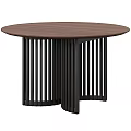 Round Wooden Table With Brown Top And Black Vertical Slat Legs