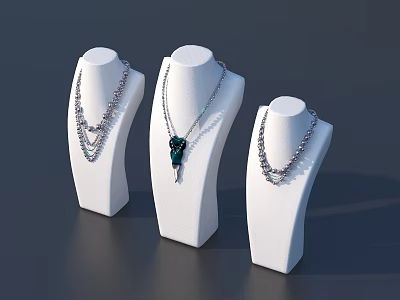 Elegant Jewelry Necklaces On White Display Stands With Layered Chains And Green Pendant 3d model