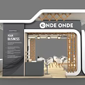 ONDE ONDE Exhibition Booth With White Tables Chairs Wooden Decorations And Green Plants
