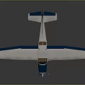 Small Blue And White Model Airplane With Biplane Wings Red Landing Gear Dark Background