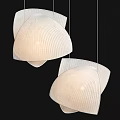 Elegant Modern Chandeliers With Curved Textured Design And Warm Lighting