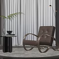 Brown Leather Leisure Chair With Curved Metal Arms In Modern Living Room Setup