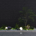 Contemporary Courtyard Garden Featuring Small Tree Green Plants Stones and Landscape Lights on Gravel Ground