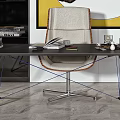Stylish Desk with Books and Chair in Interior with Yellow Horse Painting and Green Plant