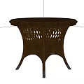 Round Brown Coffee Table With Wicker Design And Decorative Legs 3d model